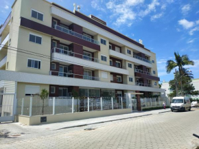 Apê novo Canasvieiras, 2 garagens, excelente localização